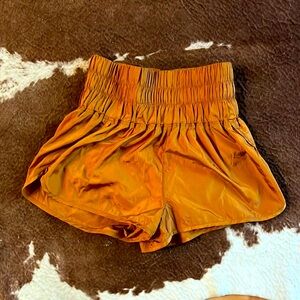 Free People Burnt orange workout shorts